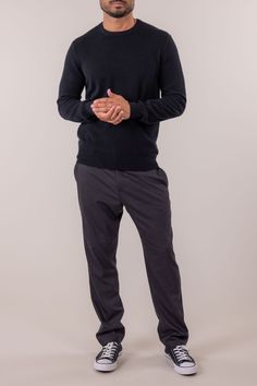 Our Classic V-Neck Sweater features a timeless look, perfect for dressy and casual occasions alike. MC81F23 - 100% Cashmere- Ribbed collar, cuffs and hem- Model is 6'2" and wearing a size Large Black Casual Sweater With Button Cuffs, Classic Black Sweater With Ribbed Cuffs, Black Business Sweater For Fall, Grey Flannel, Ink Blue, Every Man, Dress With Cardigan, Crewneck Sweater, V Neck Sweater