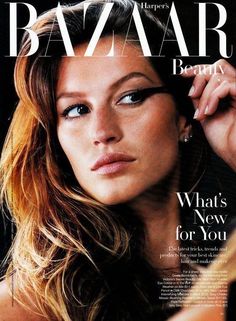 a woman with long hair on the cover of bazaar magazine