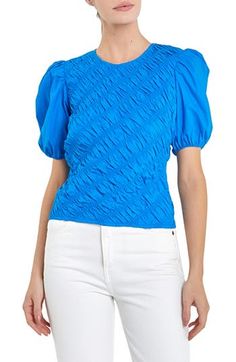 Delightful puff sleeves frame this crisp poplin top shaped by asymmetric shirring. Jewel neck Elbow-length sleeves Lined 100% cotton Hand wash, dry flat Imported Blue Blouse With Gathered Short Sleeves, Puff Sleeve Tops With Elastic Shoulders For Work, Blue Puff Sleeve Top With Gathered Sleeves, Ruched Cotton Puff Sleeve Top, Blue Puff Sleeve Top For Work, Blue Puff Sleeve Top For Workwear, Blue Top With Gathered Sleeves For Work, Blue Tops With Gathered Sleeves For Work, Blue Workwear Top With Gathered Sleeves