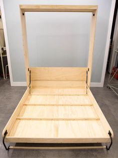 the bed frame is made out of wood