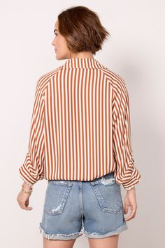 A drawstring hem adds a unique flair to this classic button-down by LNA. Crafted in lightweight fabric, this striped top features a collared neckline, relaxed fit, and two chest pockets. Pair with your favorite cutoffs and sandals for a polished summer look. | LNA Women's Alpine Drawstring Button Down Shirt, Size Large, Orange Brand Style Guide, Fashion 101, Summer Look, Fall Shopping, Tee Dress, Work Fashion, Fall Trends, Summer Looks, Lightweight Fabric