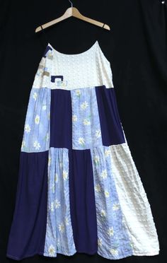 This dress is made from vintage cotton, and it is blue/off-white with little daisies and decorative patchwork. The empire waist style can be worn by many body types. To repair top, I added inner and outer patchwork - see photos. Other patches are for fun and for zero waste.  Size: Medium  Armpit to armpit: 18"  Shoulder to armpit: 11" armpit.  Empire waist: 21" across Length (shoulder to hem): 48.5" Model is 5'8" with 37 bust.  This is a pullover dress with no zippers, elastics, or buttons.  Mat Repurposed Vintage, Patchwork Dress, Vintage Cotton, Zero Waste, Cotton Dress, Empire Waist, Slow Fashion, Cotton Dresses, Favorite Outfit