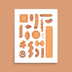 an orange and white paper cutout with different types of food items on top of it