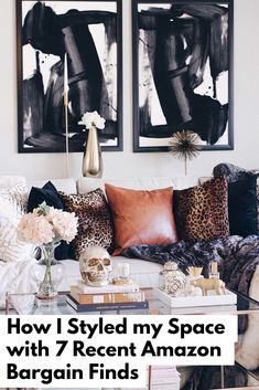 a living room filled with furniture and pictures on the wall above it's coffee table