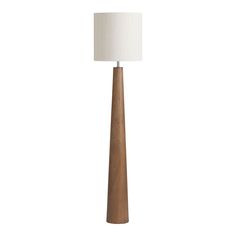 a wooden floor lamp with a white shade