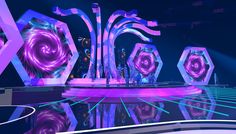 the stage is lit up with bright lights and purple swirls in front of it