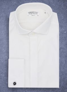 The Alexander Formal in White calls for the most special occasions. It is a truly elegant shirt, with a fine diamond pattern, spread collar and the formal French cuff. The contrasting black silk knot cufflinks are included, or pair it with your own.  The Alexander is the trimmest of all our fits, calibrated to accentuate a lean, athletic body type. • Trimmest Fit • 100% Cotton • Cut-Away Collar • French Cuff • Black & White Silk Knot Cufflink Included • Imported • Item #NFM03 Knot Cufflinks, Athletic Body Type, French Cuff Shirts, Athletic Body, Cutaway Collar, French Cuff, White French, Elegant Shirt, White Silk