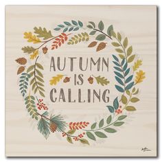 the words autumn is calling are surrounded by leaves and acorns