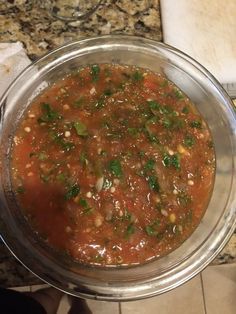 a bowl filled with soup sitting on top of a counter