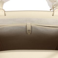 This 2024 Limited Edition Bellechasse Biaude PM bag is of sand Goyardine coated canvas and sand chevroches calfskin leather with palladium hardware, featuring two sand flat leather top handles and trim, a removable closure clip, and tonal stitching.The interior is lined in white natural canvas and has one interior floating pocket on the front wall.Origin: FranceCondition: New and never worn (plastic on handles)Accompanied by: Dustbag, closure clip and carebookMeasurements: 10.6" x 5.9" x 14.1"; Luxury Neutral Satchel Shoulder Bag, Luxury Bags With Detachable Strap In Neutral Color, Luxury Bag With Detachable Strap In Neutral Color, Beige Calf Leather Satchel With Top Carry Handle, Beige Calf Leather Satchel With Top Handle, Beige Calf Leather Satchel With Detachable Handle, Luxury Beige Shoulder Bag With Handles, Luxury Neutral Top Handle Shoulder Bag, Beige Textured Leather Top Handle Satchel