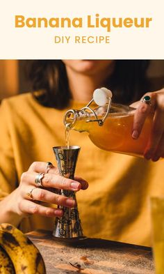 a woman pours tea into a glass in front of a banana