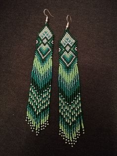 Beautiful long green earrings made of Czech beads.Length 6.5 inches (16.5cm).width 1 inch (2.5 cm).Hook-and-eye closure is hypoallergenic. Beaded Earrings Native, Red Earrings, Native American Fashion, Creating Jewelry, Green Earrings, Modern Earrings, Fringe Earrings, Seed Bead Earrings, Native American Jewelry