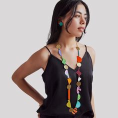 Handmade in Argentina, this bold and colorful necklace can add pops of vivid colors to any outfit. Hand painted on oxidized brass, colors of the necklace will vary compare to image. Patinas and oxides are meant to be kept dry. Water may fade the colors. These necklace can be paired with the Pebbles Earrings Set to complete the look. Bold Necklace Outfit, Multicolor Necklace With Oxidized Finish For Gift, Bold Multicolor Jewelry For Gifts, Unique Multicolor Brass Jewelry, Artsy Multicolor Necklace For Parties, Handmade Multicolor Long Necklace For Party, Handmade Bold Multicolor Jewelry, Colorful Lifestyle, Organic Earrings