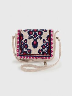 YASMINE SLING BAG – BEIGEHandcrafted Embroidered Sling Bag from India - Stylish and Artfully Designed.Elevate your style with Beige Base Sling Bag featuring intricate Blue Wool Embroidery. This Boho Chic Crossbody Bag combines practicality with a unique Artisan Design. Stand out elegantly with this Floral Embroidered Handbag, perfect for any adventure.- Material: Cotton Canvas (Embroidered)- Dimensions: (H) 6.5“x (W) 10“x (D) 2“- Bag Height including Handle = 29“- Handle Drop = 22.5" (Adjustable Multicolor Embroidered Crossbody Bag, Traditional Beige Satchel Shoulder Bag, Multicolor Embroidered Crossbody Shoulder Bag With Adjustable Strap, Traditional Beige Shoulder Bag, Multicolor Embroidered Rectangular Bags With Adjustable Strap, Embroidered Beige Shoulder Bag For Festivals, Rectangular Bag With Multicolor Embroidery And Adjustable Strap, Rectangular Bags With Multicolor Embroidery And Adjustable Strap, Blue Embroidered Crossbody Bag