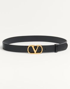 Valentino Garavani VLogo Signature belt in shiny calfskin. - Vlogo Signature buckle in antique brass finish - Shiny calfskin exterior - Calfskin interior - Dimensions: H.30 mm / 0.78 in. - Made in Italy Gold Leather Belts With Gold-tone Logo Plaque, Designer Formal Belt With Gold-tone Logo Plaque, Luxury Gold-tone Belt Buckle For Formal Wear, Elegant Formal Belt Buckle With Logo Plaque, Luxury Leather Belt Buckles For Evening, Elegant Business Belt With Gold-tone Logo Plaque, Elegant Business Belt Buckles With Metal Logo, Elegant Metal Logo Belt Buckles For Business, Elegant Gold-tone Logo Plaque Belt Buckle For Formal Occasions