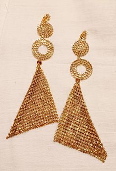 Large style These hang 6 inches Handmade originals Gold and rhinestone metal clip on Very unique gold metal mesh design Very blingy and cute These are very lightweight on the ear Easy to wear Statement style They are one of a kind These Earrings are a classic and timeless addition to any wardrobe Handmade Gold Clip-on Earrings For Party, Festive Gold Earrings With Rhinestones, Glamorous Gold Clip-on Earrings For Party, Gold Rhinestone Earrings For Festive Occasions, Gold-tone Drop Clip-on Earrings For Parties, Gold Brass Clip-on Earrings For Evening, Gold-tone Metal Clip-on Earrings For Party, Party Gold Bling Clip-on Earrings, Festive Gold Rhinestone Earrings