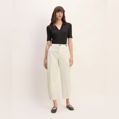 About This Style. This Piece Features A High Rise, Barrel Leg, Regular Length, Zipper Closure, Waistband Buttons On The Side Seams For Adjustability, In Organic Cotton. Fit High-Rise Inseam: 27" Waist Measures Apr. 16” Across Materials 98% Organic Cotton, 2% Elastane Care Machine Wash Cold With Like Colors. Only Non-Chlorine Bleach When Needed. Tumble Dry Low. Warm Iron When Needed. New Without Tags; Never Worn Elegant Tapered Bottoms For Summer, Fitted Everlane Bottoms For Spring, Everlane Straight Pants For Spring, Classic Everlane Bottoms For Spring, High Waist Tapered Bottoms For Summer, Spring High Waist Bottoms By Everlane, Fitted Everlane Bottoms For Workwear, Chic Everlane Bottoms For Spring, Tapered Bottoms For Summer Workwear