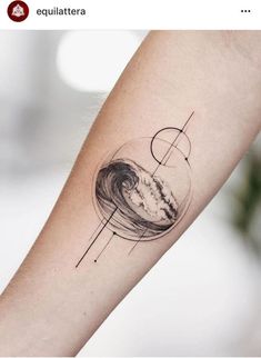 an abstract tattoo design on the arm