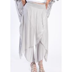 Beautiful Light Grey Silk Wrap Pants. Extremely Flattering And Very Comfortable. Features Stretchy Elastic Waistband For Comfortable Fit. Versatile Stretch Harem Pants For Spring, Versatile Harem Pants For Spring, Versatile Non-stretch Harem Pants For Spring, Solid Color Elegant Harem Pants For Spring, Elegant Solid Harem Pants For Spring, Elegant Spring Harem Pants With Elastic Waistband, Spring High-waisted Harem Pants With Elastic Waistband, Versatile Elastic Waistband Pants For Spring, Versatile Spring Pants With Elastic Waistband