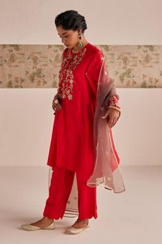 Red asymmetric kurta with zardozi embroidered floral patterns and loop detail on placket. Comes with pant and dupatta. - Aza Fashions Elegant Red Unstitched Festive Suit, Elegant Red Unstitched Suit For Festive Occasions, Elegant Red Unstitched Suit For Festive Season, Elegant Red Unstitched Suit With Dabka, Designer Red Unstitched Suit With Resham Embroidery, Elegant Red Georgette Unstitched Suit, Elegant Red Raw Silk Salwar Kameez, Designer Red Unstitched Suit In Raw Silk, Elegant Red Kurta With Zari Work