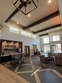 a large open living room with high ceilings