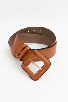 Achieve a style that is both stylish and trendy with this Sleek Square-Buckle Genuine Leather Belt. Crafted from genuine leather, it features a sleek square buckle for a modern touch. Perfect for any occasion. #completeyourlook #lovemyleto 100% Leather Imported Brown Leather Rectangular Belt Buckles, Chic Brown Belt With Buckle Closure, Luxury Brown Belt With Rectangular Buckle, Luxury Brown Belt With Silver Buckle, Brown Belt Silver Buckle, Casual Bodysuit, Bachelorette Dress, Mint Julep Boutique, Western Boho