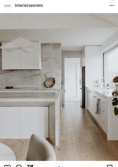 the kitchen is clean and ready to be used as a dining room or living room