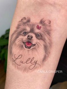 a small pomeranian dog tattoo on the right forearm and leg, with an inscription that says lovely