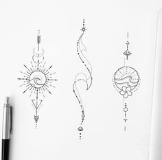 three different designs on a white sheet with a pen and some ink in the background