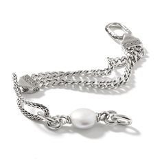 Unique, elegant, and modern, this John Hardy chain collection cultured freshwater pearl bracelet is the perfect way to bring together modern design and timeless style! The John Hardy Chain Collection is a refreshing alternative to classic sterling silver jewelry. Modern, intriguing, and creative, Chain Collection pieces bring character and personality to any outfit they accessorize. Established in Bali in 1975, John Hardy is dedicated to the creation of ultimate beauty through artisan handcrafte Modern Silver Pearl Bracelet For Formal Occasions, Timeless Silver Pearl Bracelets, Sterling Silver White Gold Bracelets With Pearl Chain, White Gold Sterling Silver Bracelets With Pearl Chain, Timeless Silver Pearl Bracelet For Formal Occasions, White Gold Sterling Silver Bracelet With Pearl Chain, Modern Pearl Chain Bracelet, Elegant White Silver Chain Bracelet, Modern Silver Pearl Bracelet With Oyster Design