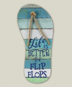 a sign that says life is better in flip flops