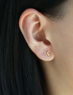 Moon stud earrings D E T A I L S * Moon is 3 x 5 mm with 5.5 mm length post * 18k gold over sterling silver // white gold over sterling silver * Nickel free and hypoallergenic P R O M O T I O N * Bridesmaids gifts: message us for a coupon code * New FACEBOOK or INSTAGRAM followers: follow us in the links below then message us for a 10% off code F A Q s For production time, shipping estimates, return policy, etc., please read our FAQs section below. S H O W U S S O M E ♥ Instagram: @Minthologie F Dainty Half Moon Charm Earrings, Dainty Half Moon Earrings With Moon Charm, Minimalist Moon Shaped Single Earring, Minimalist Moon Earrings For Everyday, Dainty Moon Shaped Single Earring, Dainty Single Moon Earring, Minimalist Moon-shaped Everyday Earrings, Moon Shaped Cartilage Earring As Gift, Moon Shaped Single Cartilage Earring As Gift