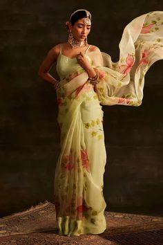 Pastel light green handwoven organza saree with all over floral print and mukaish embroidery. Comes with blouse fabric.
Component: 2
Pattern: Handwoven, Printed and Embroidered
Type Of Work: Floral Print and Mukaish Work
Fabric: Organza
Color: Green
Other Details: 
Floral pattern
Scattered embroidery
Note: The blouse and accessory worn by the model is not for sale
Occasion: Sangeet,Destination Wedding - Aza Fashions Mukaish Embroidery, Mukaish Work, Powder Blue Color, Kota Silk Saree, Floral Print Sarees, Saree For Women, Hand Painted Sarees, Organza Sarees, Organza Saree