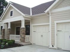 a house with two garages on each side