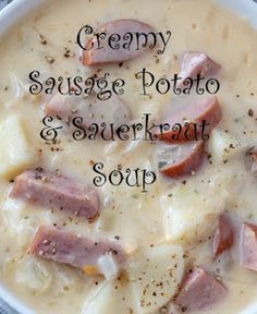 creamy sausage potato and sauerkraut soup in a white bowl