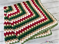 two crocheted blankets sitting on top of each other