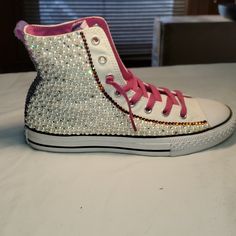 Need To Be One Of A Kind?Well Here Ya Go..Brand New (Tags Still Attached) And Made With Only The Finest Most Sparkling Stones Around. Pearls And Stones On Both Sides And Laced With Swarovski Crystals Around Logo, Up The Back. And Down The Seams...Your Personal Disco Ball Footwear...Size 5 In Juniors Which Also Fits A Woman's 7..Makes A Perfect Gift White Embellished Lace-up Sneakers, White Rhinestone Round Toe Sneakers, White Embellished High-top Sneakers, White High-top Sneakers With Rhinestones, Casual White Embellished Sneakers, White Custom Lace-up Sneakers With Rhinestones, White Lace-up Custom Sneakers With Rhinestones, Pink Embellished Low-top Sneakers, Converse Sneakers With Rhinestones And Round Toe