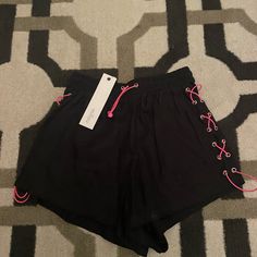 Brand New With Tags Black Millau Shorts From Lf With Neon Pink X Detail Size Small Retail $120 Black Summer Shorts For Loungewear, Black High Waist Shorts For Loungewear, Summer Loungewear Black Bottoms, Trendy Drawstring Shorts, Trendy Pink Shorts For Night Out, Black Vacation Shorts For Spring, Black Shorts For Spring Vacation, Black Shorts For Vacation In Spring, Spring Vacation Black Shorts