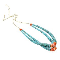 Here's a vintage handmade two strand jacla or jocla necklace. Jaclas were originally Navajo or Pueblo earrings that were tied through the ear lobes. When not worn, they were tied on to the bottom of beaded turquoise, coral or shell necklaces.  This necklace was handmade at Santo Domingo or Kewa Pueblo of graduated, hand shaped block turquoise beads, coral, and natural spiny oyster shell corn. It measures 26" long and is meant to be tied on to your neck with strong string that is knotted at the ends.  The piece comes from the estate of a prominent New York City collector, who purchased it from a Native American woman many years ago at Santa Fe's esteemed Indian Market. The collector assumed that the piece was natural turquoise and paid hundreds of dollars for it. Today, a vintage jocla neck Native American Woman, Indian Market, Santa Fe Nm, American Woman, Spiny Oyster, Hand Shapes, Oyster Shell, Shell Necklaces, Natural Turquoise