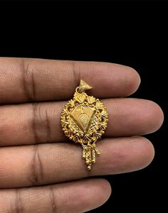 22k Yellow Gold Pendant Indian Handcrafted Yellow Gold Pendant  Metal - Yellow Gold ( 22k ) Pendant width - 0.75 inch Pendant height  - 1.5 inch Weight - 2.2 grms Yellow Gold Filigree Jewelry For Puja, Heavy 22k Gold Jewelry, Ornate 22k Gold Jewelry, Ornate Gold Jewelry, 22k Gold Locket Jewelry For Festivals, 22k Yellow Gold Jewelry For Diwali, Heavy 22k Gold Pendant Jewelry, Gold Meenakari Round Pendant Jewelry, Gold Jewelry With Meenakari For Puja