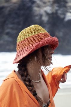 These unique bucket hats were inspired in the landscapes of Peru. Functional, aesthetic and timeless hats made out of organic fique yarn. Hand knitted with love and patience in Curiti, a town of artisans located in the beautiful mountains of Colombia. PRODUCT INFO:  Interior lining Our products are handcrafted sustainably with Fique, an artisanal yarn produced in Colombia, which comes from the Fique plant, endemic from the Andes region. Fique crops are regenerative don't use any pesticides or fertilizers. Casual Woven One Size Hat, Casual Handwoven Crochet Hat With Curved Brim, Casual Woven Bucket Hat For Warm Weather, Casual Woven Yarn Bucket Hat, Casual Handwoven Brimmed Crochet Hat, Casual Handwoven Brimmed Hat, Casual Brimmed Handwoven Crochet Hat, Casual Brimmed Crochet Hat Handwoven, Orange Cotton Beach Hat