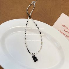 Material: Beads/Beads Style: Korean Korean Style Trendy Black Necklace With Colorful Beads, Trendy Black Beads Necklace For Party, Trendy Black Beaded Necklaces For Party, Trendy Black Beaded Necklace For Party, Casual Black Necklace For Party, Black Round Bead Jewelry With Letter Details, Black Beaded Necklace With Letter Beads, Black Beaded Necklace With Letter And Round Beads, Black Necklaces With Round Letter Beads