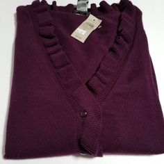 Large Ann Taylor** Cardigan Sweater In The Color Of Eggplant ... 1st Picture Is The Best One For Color. Ruffle Around The V Neck, Down The Front Where The Buttons Are. Long Sleeves. Chest 20.25" Back Length Not Including The Ruffle 22" Flat Lay Measurements Approx Non Smoking/Pet Friendly Home V-neck Ruffled Cardigan For Layering, V-neck Ruffled Sweater For Fall, Elegant Purple Sweater For Fall, Elegant Purple Winter Cardigan, Purple Cardigan For Workwear, Fall Season, Purple Cardigan For Workwear In Fall, Purple Cardigan For Fall Workwear, Purple Cardigan For Work In Fall, Casual Ruffled Cardigan For Fall