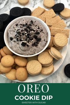 an oreo cookie dip with cookies and crackers on the side is featured in this recipe