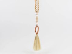 Worry Beads – Fredericks and Mae Spiritual Tassel Necklaces With Adjustable Fit, Adjustable Spiritual Tassel Necklaces, Spiritual Necklace With Natural Wooden Beads, Bohemian Beige Jewelry For Meditation, Wooden Beads Amulet Jewelry For Meditation, Meditation Amulet With Wooden Beads, Bohemian Beaded Rosary For Meditation, Natural Wooden Beads Spiritual Jewelry, Bohemian Natural 8mm Bead Jewelry