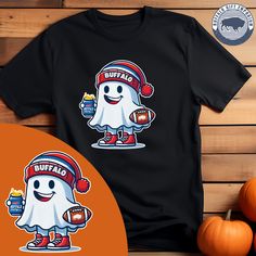 Introducing the Buffalo Football Ghost T-Shirt - perfect for fall or Halloween celebrations! Show off your love for the team and add a touch of festive spirit with this fun and stylish shirt. Get yours today and stand out from the crowd! Made to order. Fan Apparel T-shirt With Mascot, White Team Spirit T-shirt For Fall, Sports Fan T-shirt With Mascot For Fan Merchandise, White Mascot T-shirt For Football Season, Game Day Fan Apparel T-shirt With Mascot, Fan Apparel T-shirt With Mascot For Game Day, Mascot T-shirt For Fans, Short Sleeve, White Mascot T-shirt For Fans, White Mascot T-shirt For Fan Gear