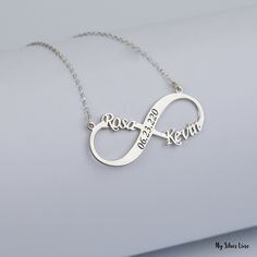 "Infinity Name Necklace is made by hand in our workshop with care. All our jewelry is the most elegant choice for the Bridesmaids, friends, your loved ones and for yourself. Infinity Name Necklace * Material: High Quality Solid 925 Sterling Silver. * Finish: Sterling Silver ∙ Gold ∙ Rose Gold. * All our jewelry is custom made by hand with care in our workshop. HOW TO ORDER ❓ * Select your necklace COLOR. * Choose necklace length from 14\" to 22\". The length option is the TOTAL chain length (inc Personalized Infinity Jewelry, Customized Elegant Infinity Jewelry, Elegant Customized Infinity Jewelry, Elegant Infinity Necklace With Custom Name, White Infinity Jewelry Gift, White Infinity Jewelry For Gifts, White Infinity-shaped Jewelry Gift, Customizable Infinity Necklaces For Anniversary, Customizable Infinity Jewelry For Mother's Day