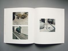 an open book with pictures of people walking on the sidewalk and in front of them