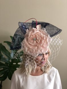 This beautiful custom Kentucky Derby hat/fascinator is the perfect piece for any Derby, Oaks, or Race Day outfit. Please note hats/fascinators are one size fits most; if you need additional specifications on hat/fascinators dimensions feel free to message us. All sales are final. Hok124-02 Custom Formal Hat For Kentucky Derby, Custom Hat For Kentucky Derby, Elegant Handmade Headpieces For Kentucky Derby, Handmade Elegant Headpiece For Kentucky Derby, Handmade Structured Crown Fascinator For Kentucky Derby, Handmade Fascinator For Kentucky Derby With Structured Crown, Handmade Kentucky Derby Fascinator With Structured Crown, Custom Fitted Top Hat For Kentucky Derby, High Crown Headpieces For Royal Ascot Races