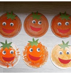 paper plates with faces made to look like carrots